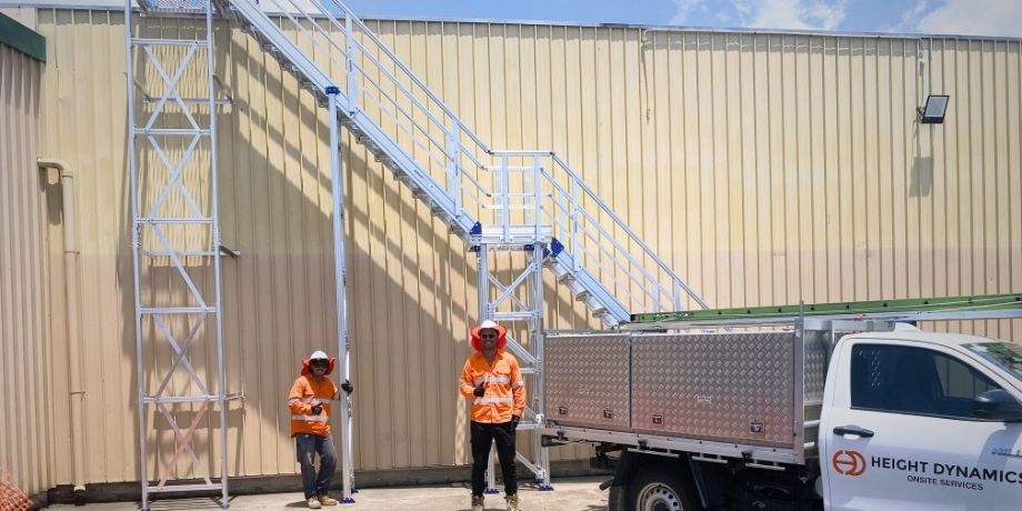 Height Dynamics team clearing site after installation of fixed external stair system